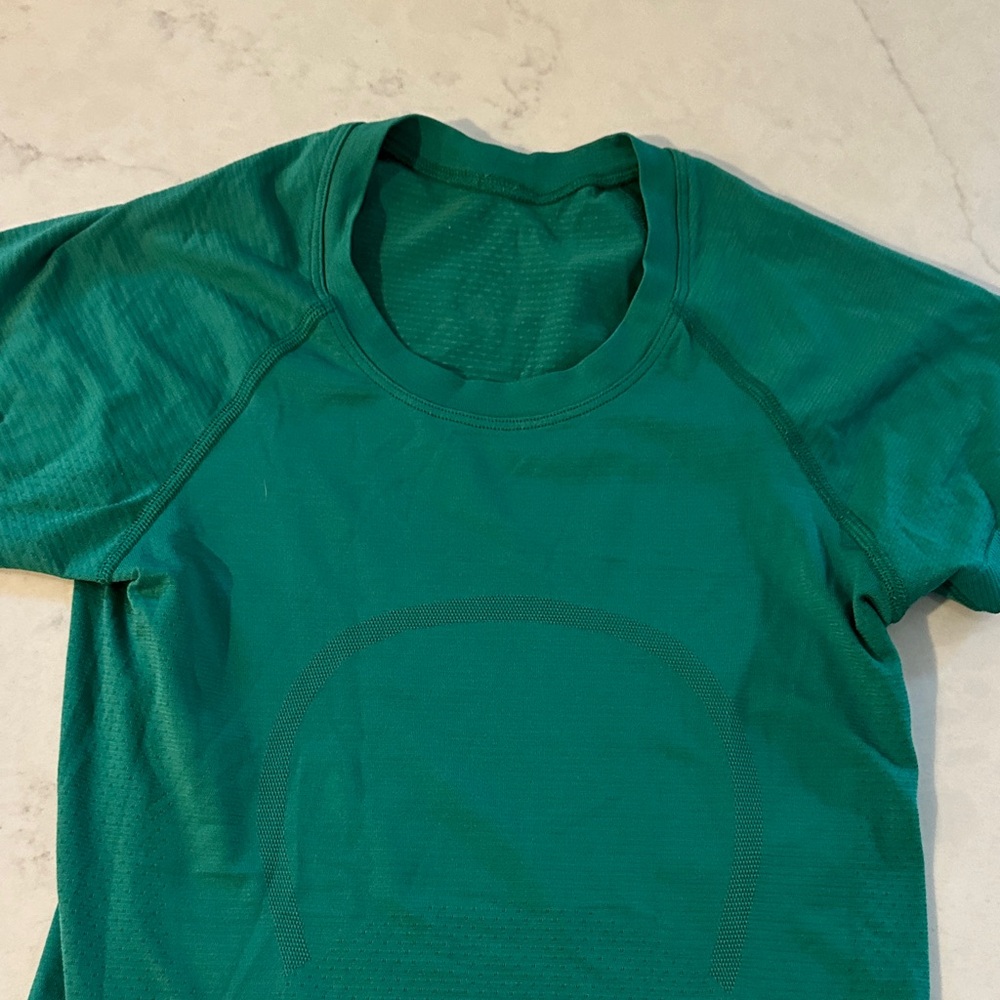 Woman’s Green Athletic Shirt